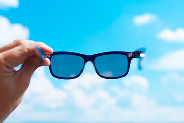 sun glasses and sky