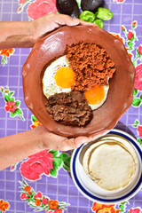 Traditional Mexican dish, eggs, beans and chorizo.