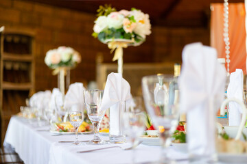 Glasses and napkins on a served table European Russian cuisine event holiday