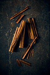 Ceylon Cinnamon Sticks on rustic background. Top view