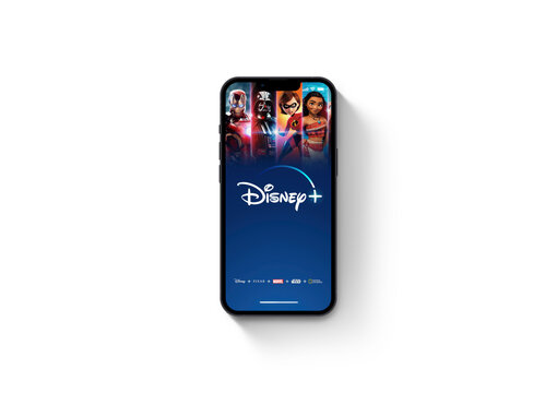 Disney+ (Disney Plus) app on the smartphone iPhone 13 screen. White background. Rio de Janeiro, RJ, Brazil. January 2022