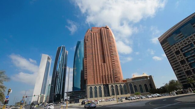 ABU DHABI, UAE - DECEMBER 10, 2016: Buildings and street of Abu Dhabi along Corniche Road on a sunny day