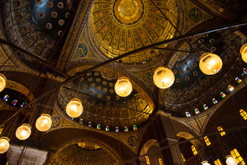Fototapeta na wymiar Interior, ceiling, decoration and hanging lamps in the Alabaster Mosque, Islamic Quarter, Cairo, Egypt