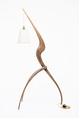 Large, modern, decorative lamp made of natural oak wood on a white background