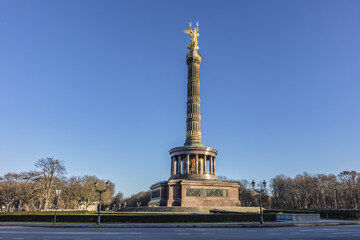 Fototapeta na wymiar Berlin Victory Column (Siegessaeule, 67 metres,1864) with Statue of Victoria (Goldelse) on top, to commemorate Prussian victory in Second Schleswig War. Berlin, Tiergarten, Germany.