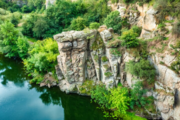 Amazing aerial view of Buky canyon on a sunny day. Buka canyon on the Girsky Tikich river, Cherkasy region, Ukraine. Concept, travel, outdoor recreation