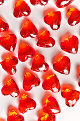 Full Frame Image of Sparkling Red Gemstone Hearts on a White Studio Background