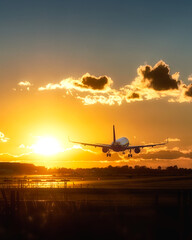 Fototapeta na wymiar Airplane in sunset