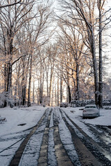 Richmond, Virginia, - 1/4/2022 - The first snowfall in the suburbs of Richmond with snow covered trees, snowy roads and icicles. 