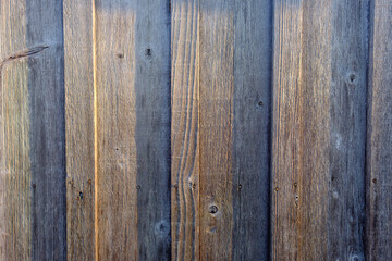 Obraz premium Abstract image of sunrise on a wood fence