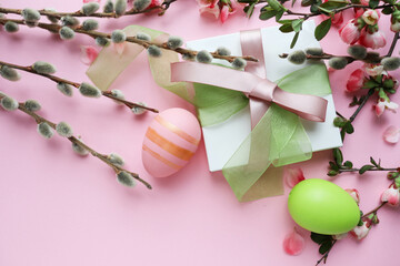 Easter greeting card mockup. spring flowering branches and Easter eggs. space for text 