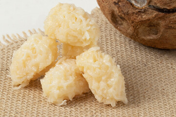 Focus on delicious dessert cocada (coconut candy).