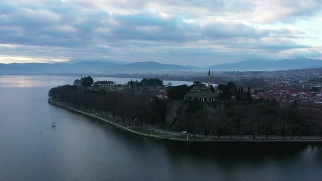 Aerial view of Ioannina city in Greece, Aslan Pasha Tzami, the lake with the island of Kyra Frosini or nissaki.