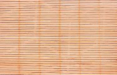 Background Texture of wooden bamboo mat for sushi making, rolls.