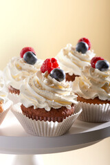 cupcake with cream and berries