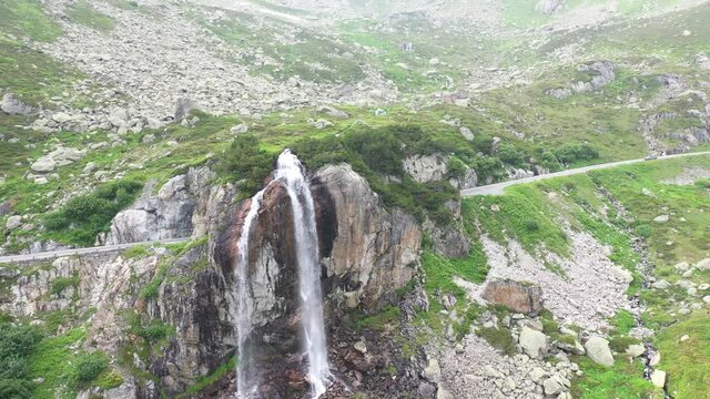 Amazing footage of a wonderful waterfall in Switzerland. epic shot with a drone.