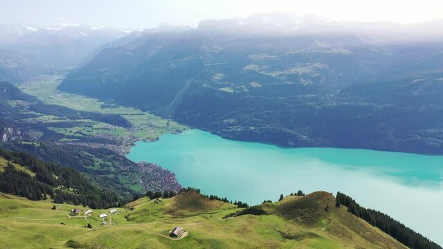 Amazing footage over the beautiful places in Switzerland. A wonderful areal flight at a sunny day in the alps. Epic drone flight over the beautiful mountains at the lake Brienz called Brienzergrat.