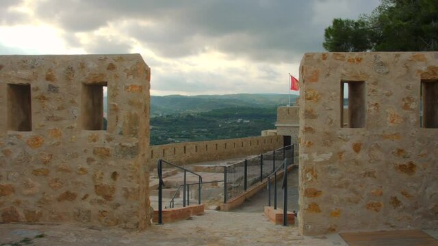 Segorbe, Spain. Walls of Castle Alc&aacute;zar of Segorbe (castle of star) on the slopes of Sope&ntilde;a in the town of Segorbe, in the Valencian Community of Spain on a cloudy day.