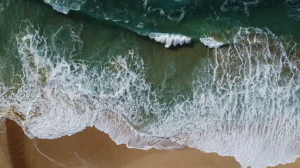 Crashing Waves on Hawaii Beach Bird's eye view drone