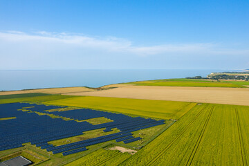 Norman Solar Panels in the beautiful countryside in Europe, France, Normandy, in summer on a sunny day.