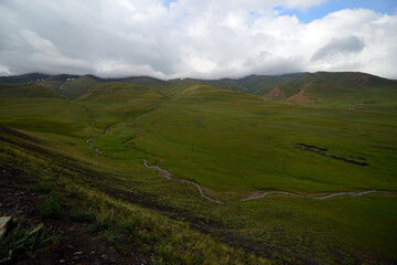 kyrgyzstan, landscape with clouds. 