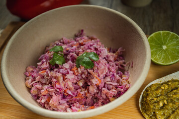 coleslaw in an ecological wooden plate