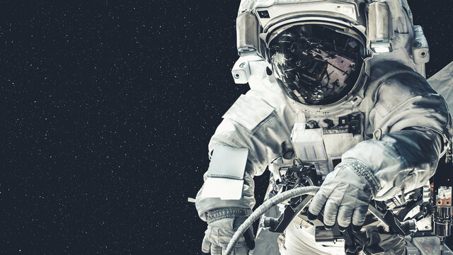 Astronaut spaceman do spacewalk while working for spaceflight mission at space station . Astronaut wear full spacesuit for operation . Elements of this image furnished by NASA space astronaut photos .