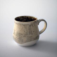 handmade ceramic mug with interesting design