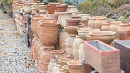 decorative handmade clay pots in a plant nursery