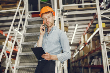 Engineer checking the products in the control room