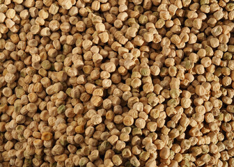 Background of dried green pea seeds. Abstract natural background. Yellow pea seeds