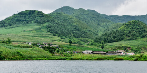 Scenery along the North Korean coast opposite the Yalu River in Dandong, China