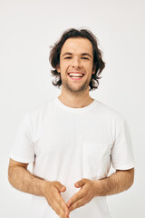 Attractive man in white t-shirt fashion cropped view isolated background