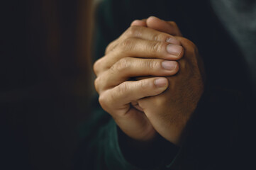 Man worship pray for god blessing to wishing have a better life. Man hands holding praying to god...
