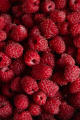 Raspberry berries close-up. Background of ripe red raspberries, close up