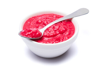 Horseradish red sauce in ceramic bowl isolated on white