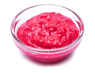 Horseradish red sauce in glass bowl isolated on white