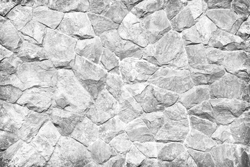 White grey rock wall with seamless patterns on background