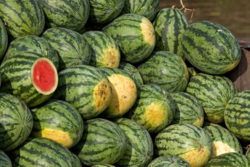 Watermelons, floating market,Vam Co Tay River. Near Tan An Town. Vietnam. Asia.