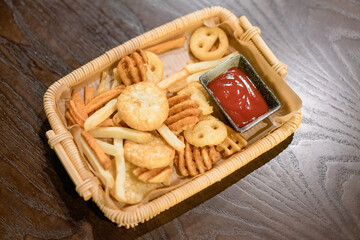 French fries and potato cakes on the table
