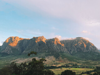 Beautiful scene with big mountain and valley at sunset