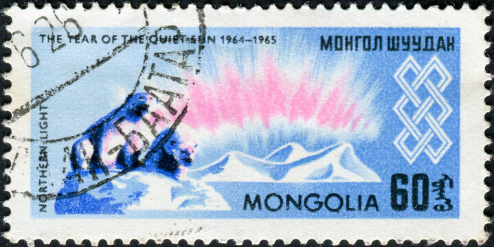 MONGOLIA - CIRCA 1965: Stamp printed by Mongolia, shows polar bears and northern light. International Year of the Sun series
