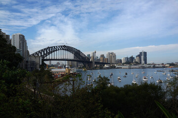Beautiful scenic view of Sydney City Center, Harbour Bridge, Luna Park, boats and yachts from Lavender Bay