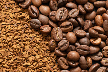 granular coffee and whole coffee beans on isolated background, coffee