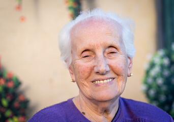 Aged candid woman close up portrait , high photo 