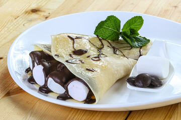 Pancake with marshmallow and chocolate