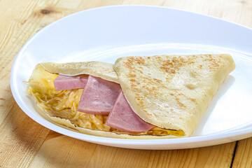 Pancake with ham and cheese