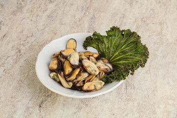 Tasty marinated mussels in the bowl