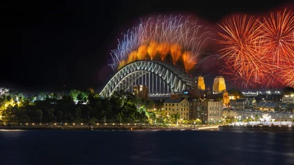 Foto op Canvas city harbour bridge illuminated with vivid colours from NYE New Years Eve fireworks NSW Australia  © Elias Bitar