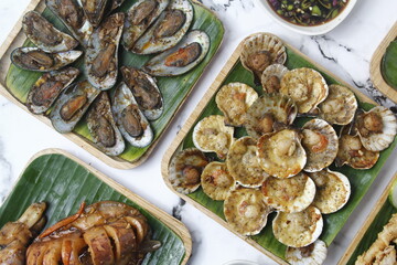 Freshly cooked mussels, baked scallops and grilled cuttlefish